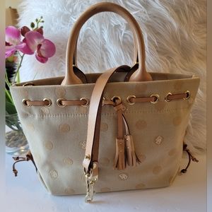 Dooney and Bourke tan polka dot handbag with crossbody leather strap